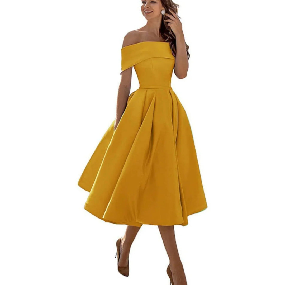 Vestito donna midi con spalle scoperte, per un tocco di classe in ogni evento speciale.