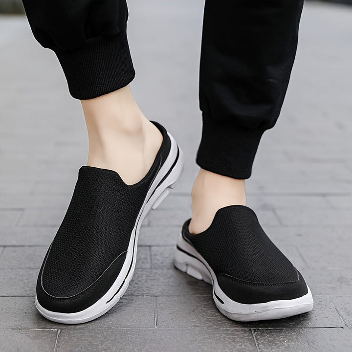 Pantofole uomo ortopediche slip-on grigie. Comfort traspirante e antiscivolo per il benessere dei piedi a casa.