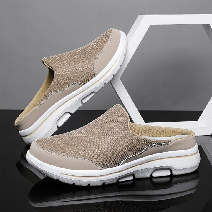 Regalo uomo ideale: pantofole ortopediche slip-on. Comfort antiscivolo e traspirante per il benessere dei piedi.