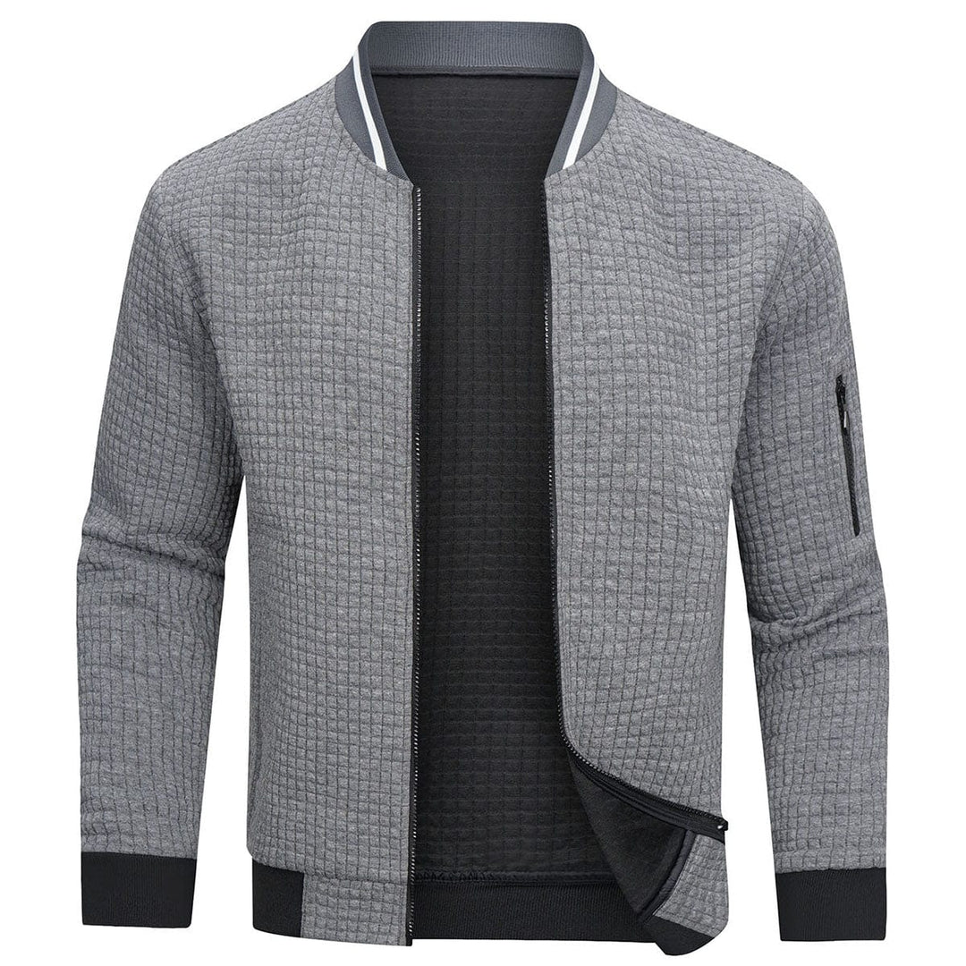 Cardigan uomo con zip, design moderno ed elegante. Ideale per look versatili, casual o formali.