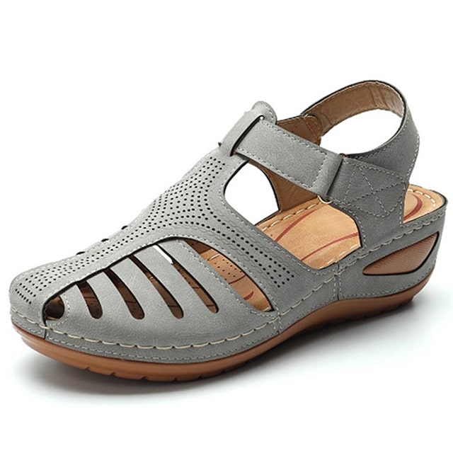 Sandali comodi donna con design sofisticato e materiali traspiranti, offrono comfort duraturo.