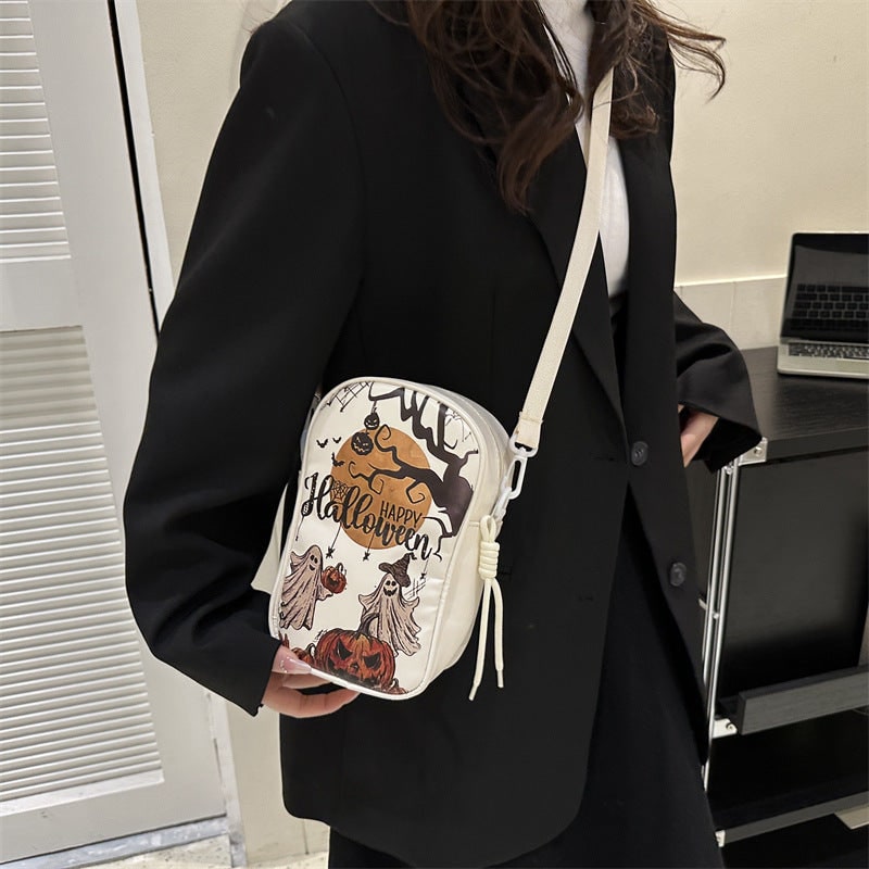 Borsa a tracolla da donna per la festa di Halloween, design festivo con decorazioni spaventose.