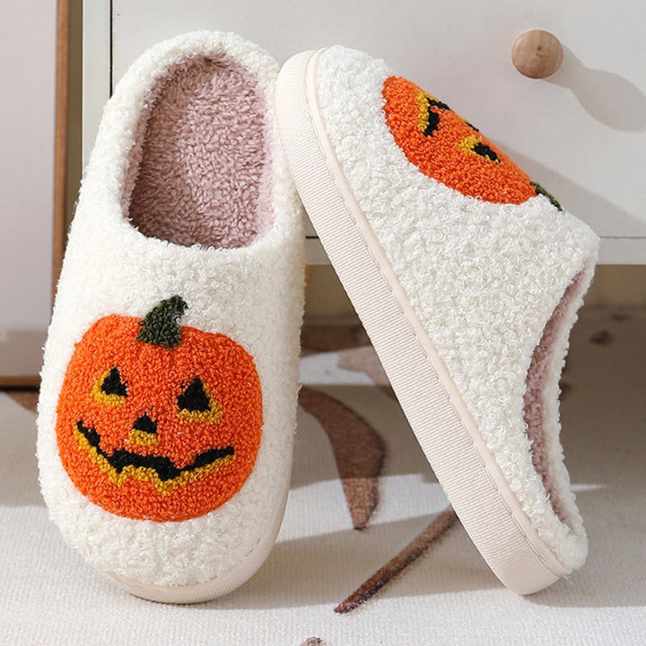 Ciabatte unisex a tema Halloween, design zucca, slip-on con supporto arco per casa e feste autunnali.