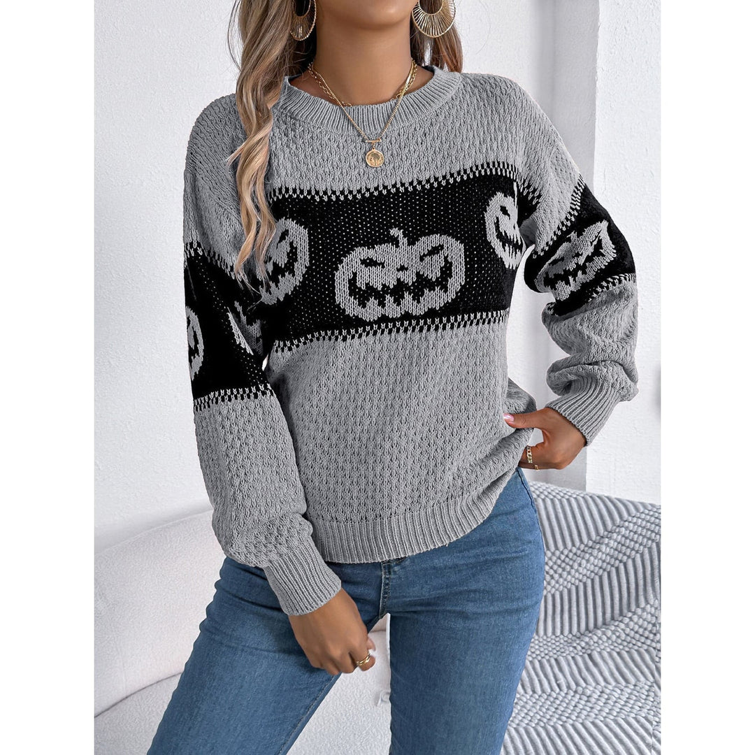 Maglia donna stagionale Halloween con grafica zucca divertente. Capo moda girocollo per l'autunno.