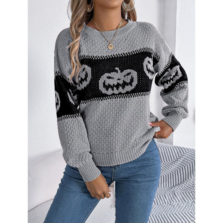 Maglia donna stagionale Halloween con grafica zucca divertente. Capo moda girocollo per l'autunno.