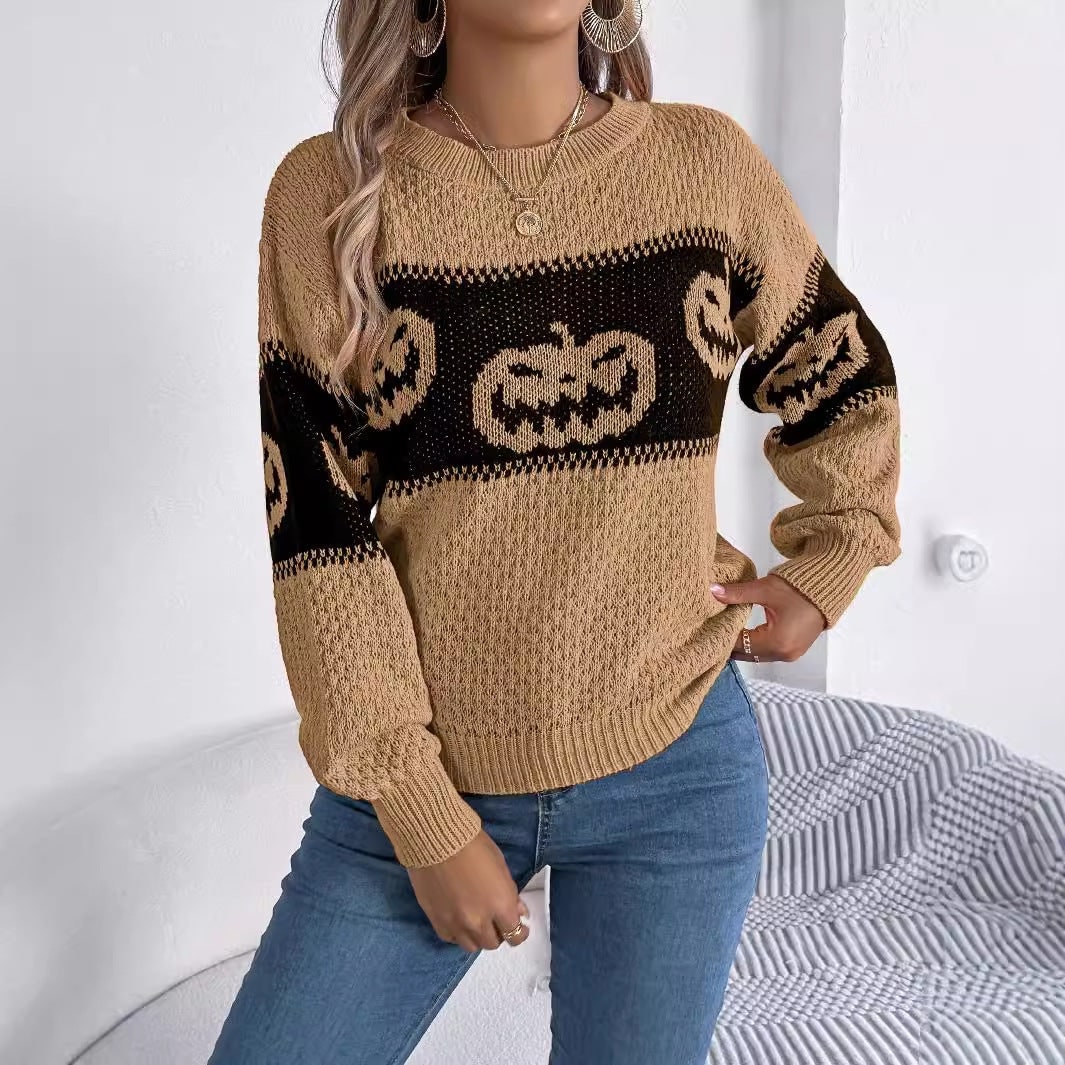 Elegante maglione donna autunnale girocollo, tema Halloween con zucca. Ideale per un look casual e festivo.