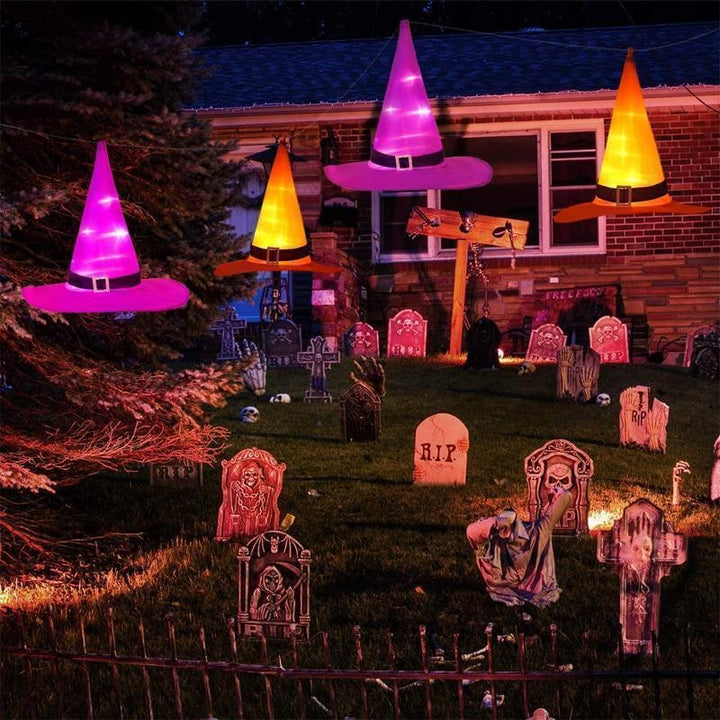 Cappello da strega Halloween con luci LED, perfetto per decorare giardino o portico con magia spettrale.