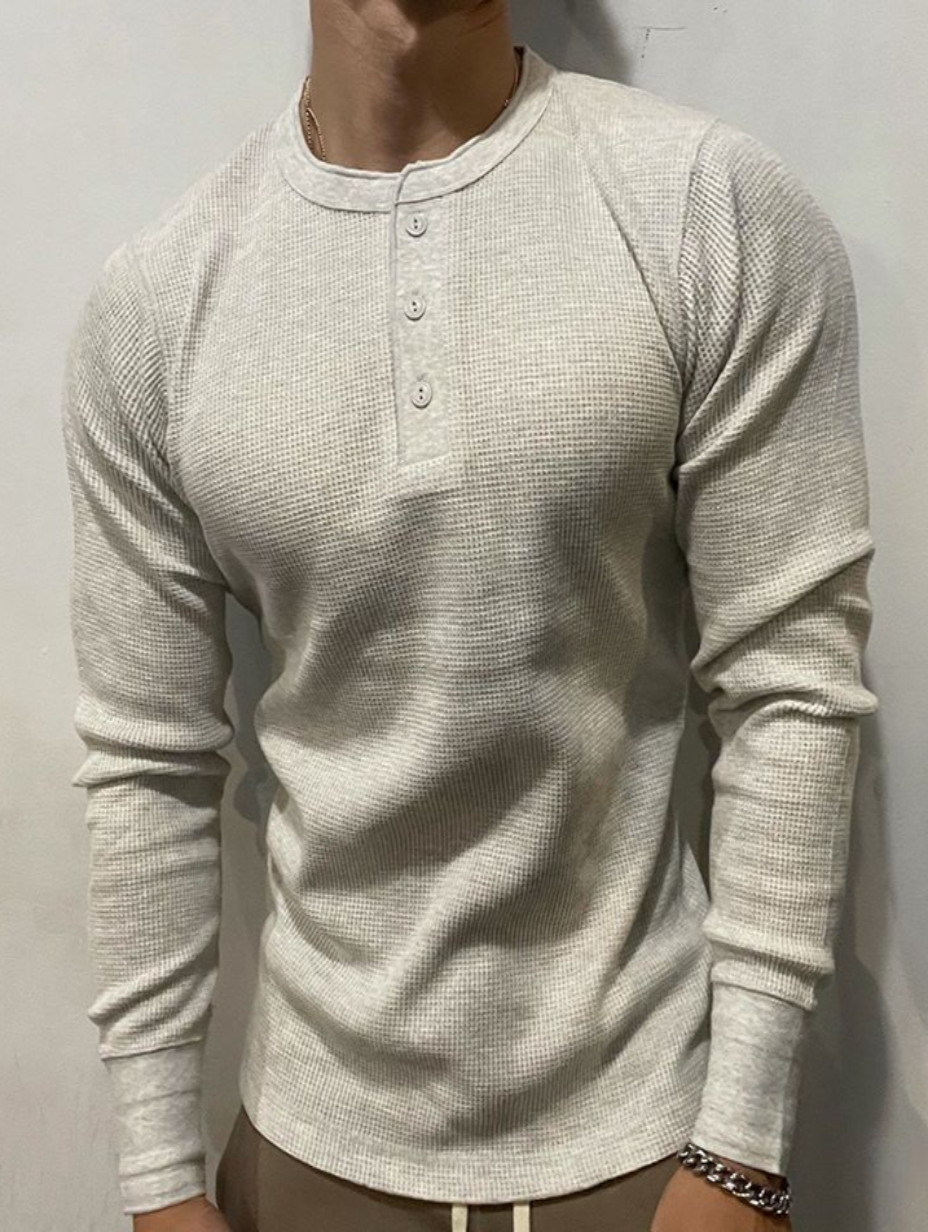 Maglietta uomo slim fit Henley a maniche lunghe, design casual. Essenziale per il guardaroba maschile.