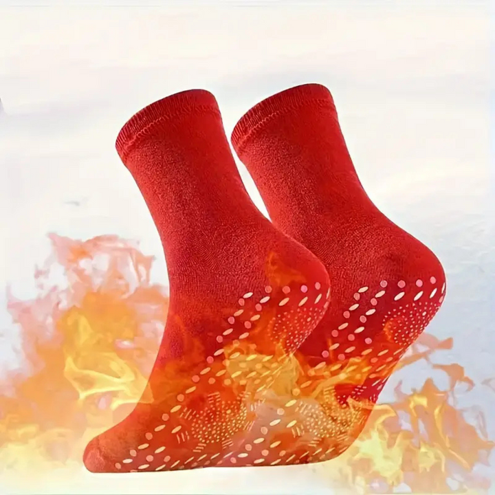 Calze riscaldanti unisex per sci, escursionismo e outdoor, con suola antiscivolo per stabilità e calore.