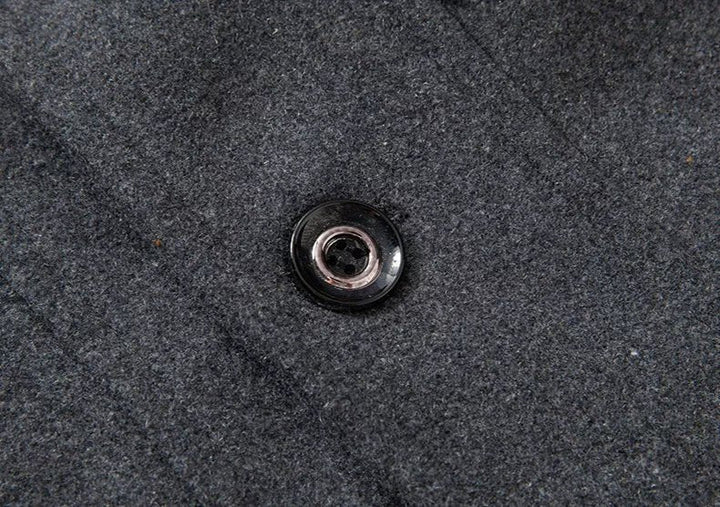 Cappotto monopetto da uomo, design moderno e classico per un inverno all'insegna dello stile e del calore.