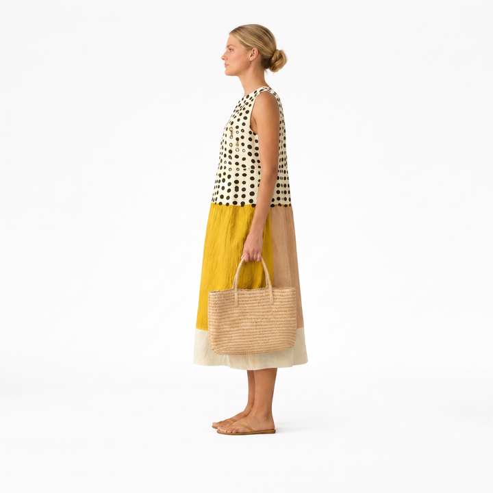 Abito midi donna a pois e color block, in tessuto leggero di cotone viscosa, per un outfit primaverile casual.