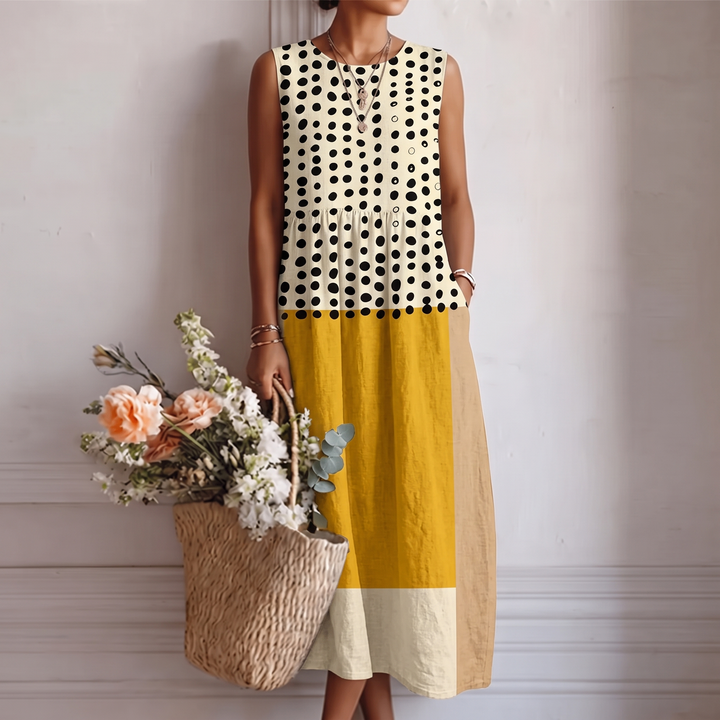 Abito midi donna estivo a pois color block in cotone viscosa, perfetto per un look casual primavera.