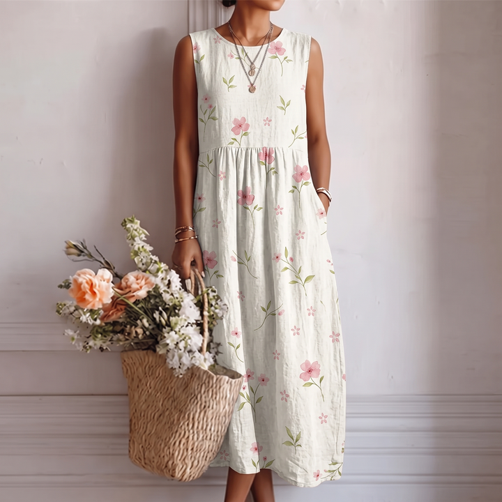 Abito midi donna floreale senza maniche, perfetto per eleganza estiva e primavera. Comodo e versatile.