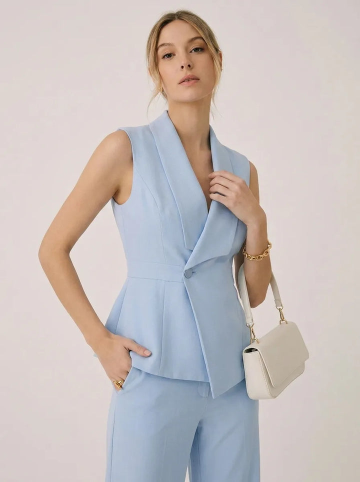 Set completo donna: top halter con scollo a V e pantaloni larghi per un outfit fluido ed elegante, disponibile in nero.