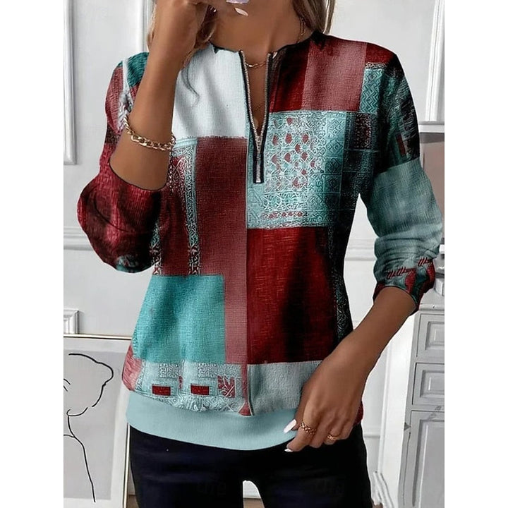 Top donna felpa color block in moda casual con mezza zip. Tonalità di tendenza: kaki, marrone, verde chiaro. Comfort e stile.