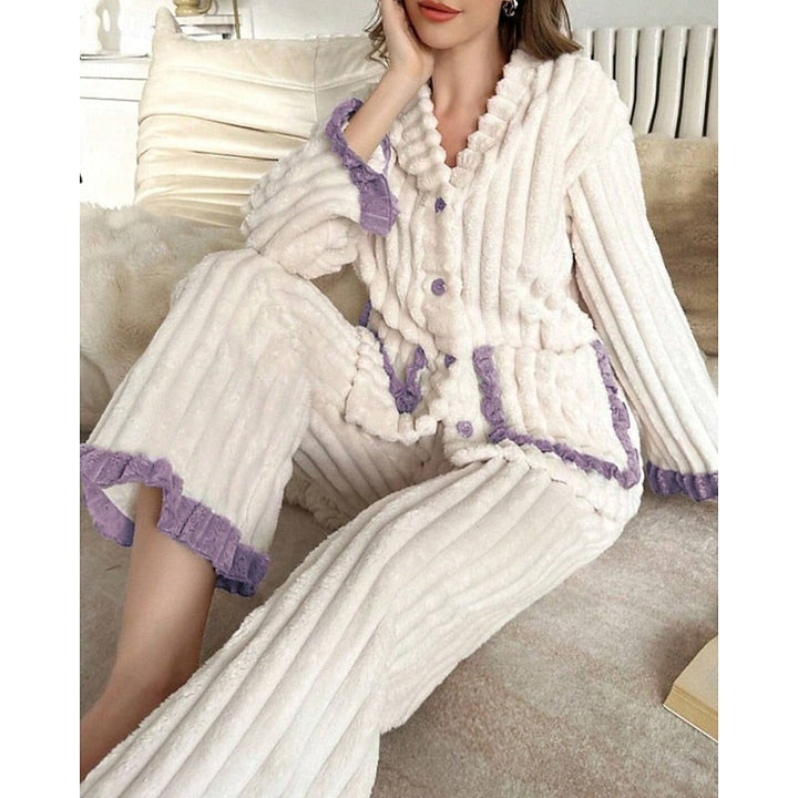 Completo donna a coste viola con volant, versatile set con vita elasticizzata per look chic.