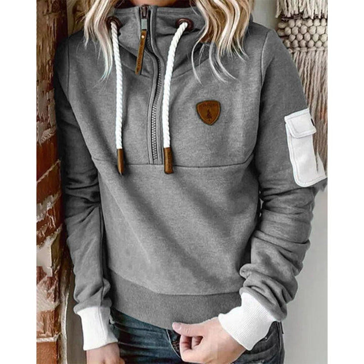 Morbida felpa con cappuccio donna, tessuto avvolgente per comfort elevato. Design elegante e versatile. Maglione donna.