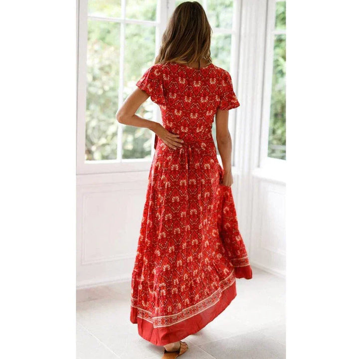 Vestito maxi boho estivo rosso da donna, fluido con design a portafoglio e spacco. Perfetto per festival e casual.