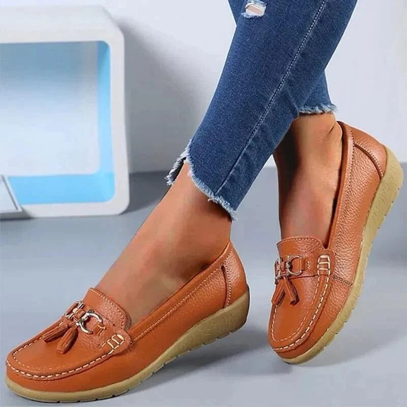 Mocassini da donna eleganti con plantare di supporto per comfort quotidiano e stile casual.