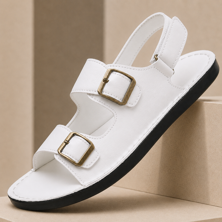 Calzature uomo: sandali regolabili con doppio cinturino a strappo, ideali per viaggio e relax estivo.
