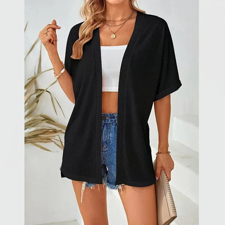 Cardigan donna elegante casual, manica corta, un capo essenziale per il tuo stile.