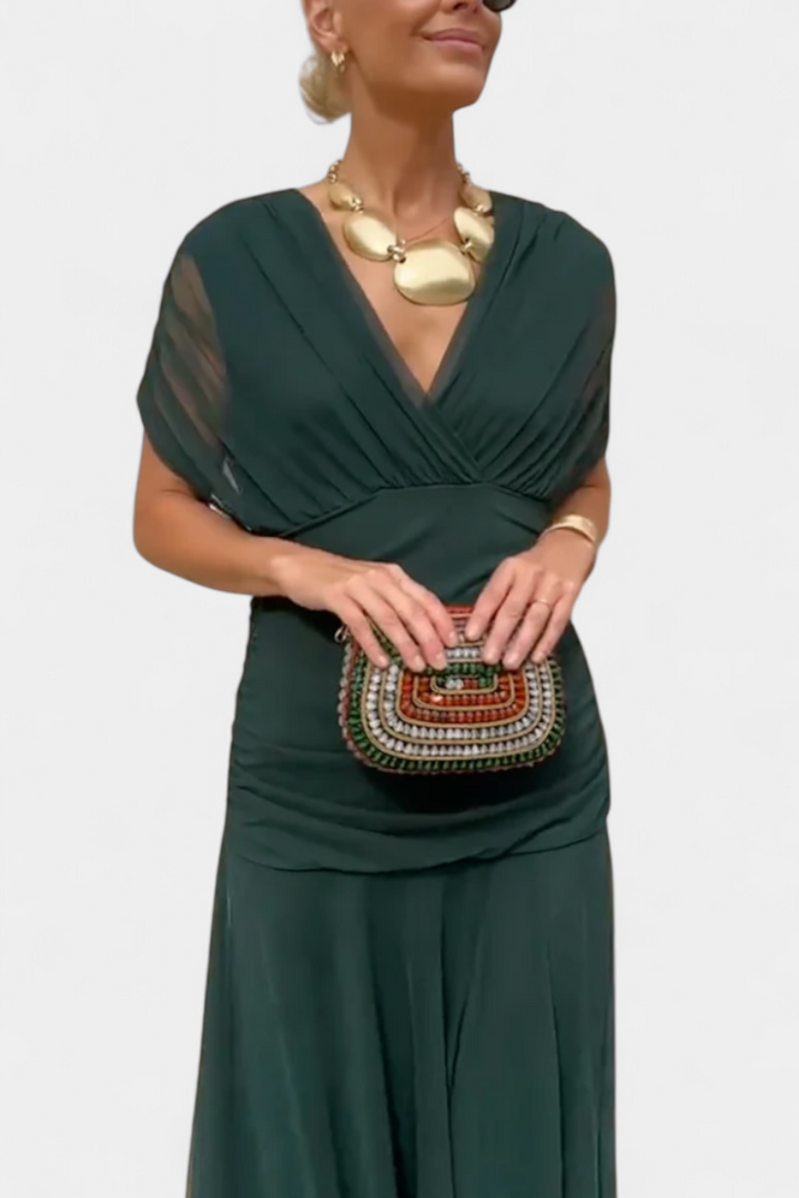 Abito lungo donna senza spalline, corpetto drappeggiato. Un capo versatile per look eleganti e raffinati.