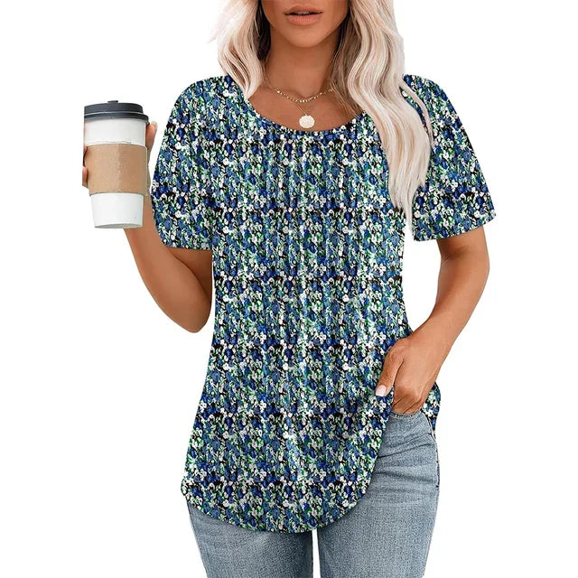 Camicetta versatile donna, plissettata con manica corta. Scollo tondo. Ideale per abbigliamento estivo.