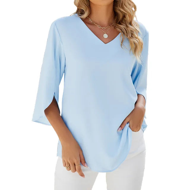 Elegante camicetta donna per ufficio, con scollo a V e maniche a tre quarti, per un look professionale.