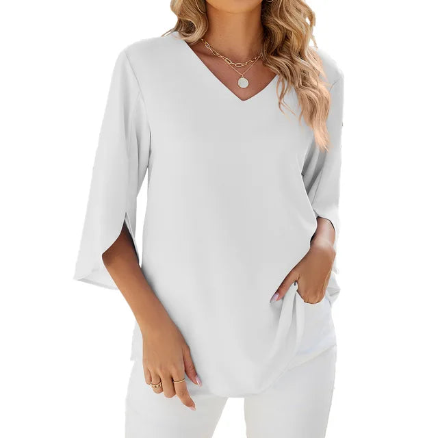 Blusa femminile primaverile/estiva, con scollo a V e maniche a 3/4, comoda e adatta all'abbigliamento quotidiano.