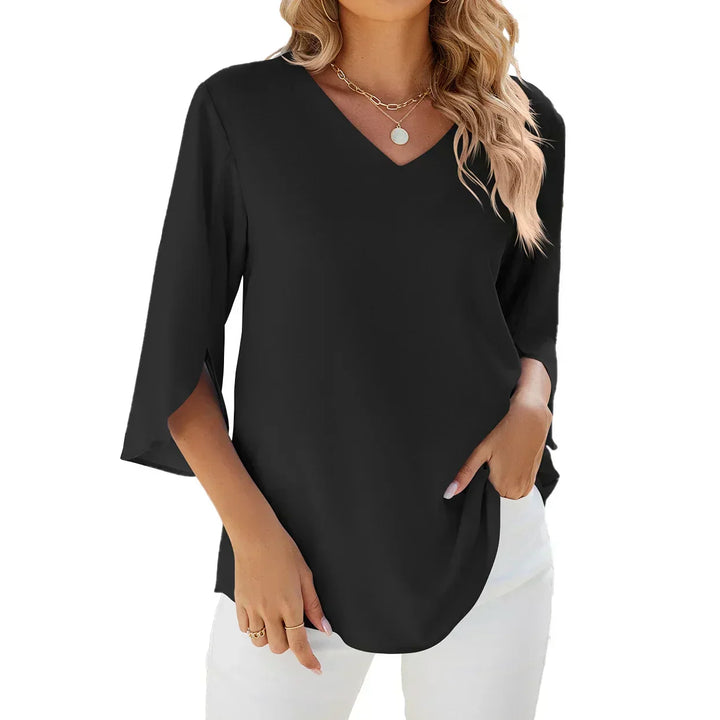 Moderna camicetta donna elegante e casual, scollo a V e maniche a 3/4, un must-have per la moda femminile.
