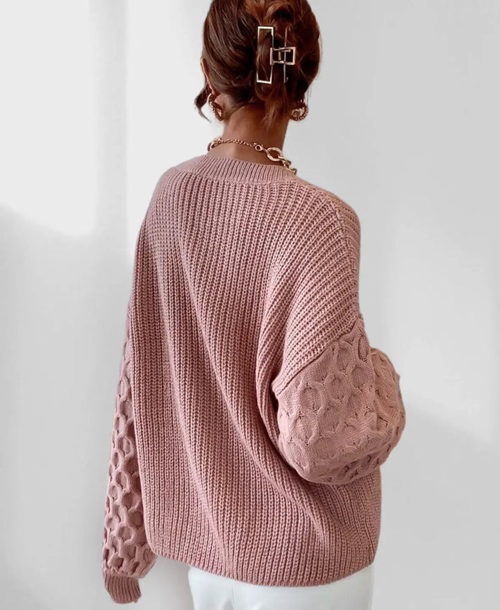 Maglione donna invernale di tendenza, con maniche a palloncino e maglieria calda, moda donna.