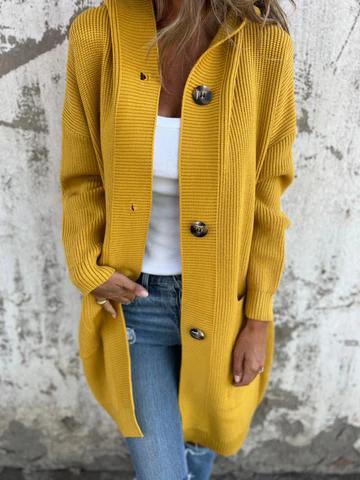 Cardigan duster autunnale donna, elegante e versatile, ideale per la moda femminile.