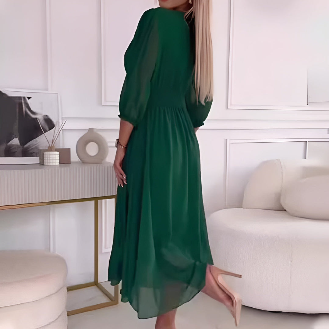 Vestito elegante donna midi avvolgente svasato, ideale per cerimonie, cocktail e feste raffinate.