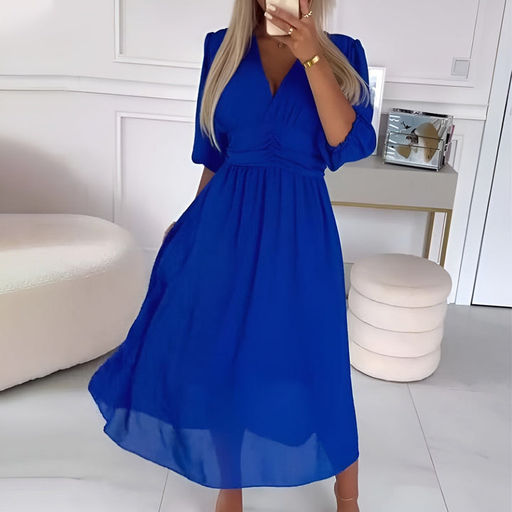 Vestito midi donna avvolgente elegante con scollo a V, taglio svasato. Ideale per cerimonie e feste.