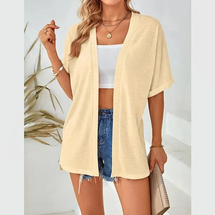 Cardigan donna casual a manica corta, vestibilità elegante. Perfetto per primavera estate.