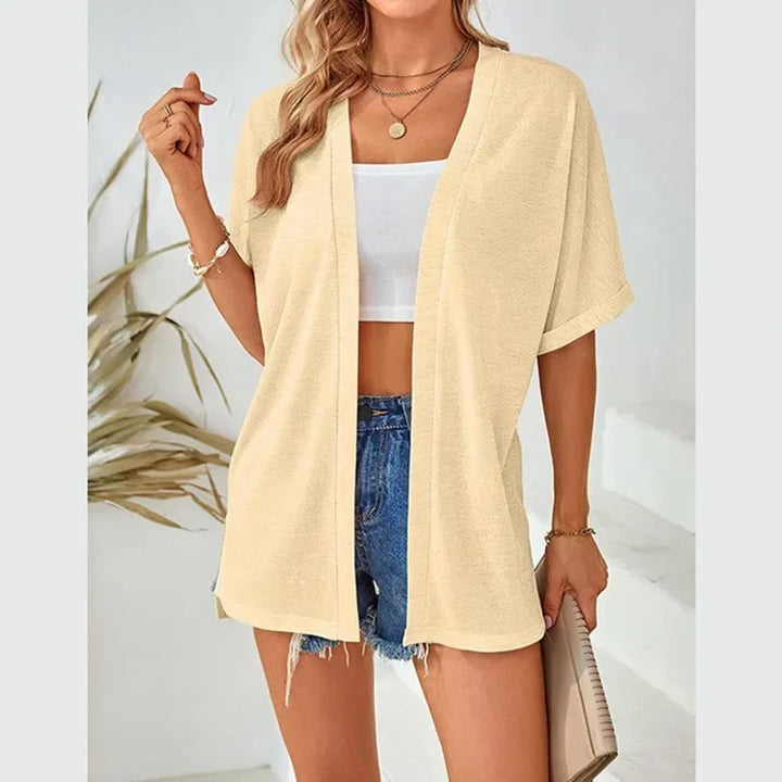 Cardigan donna casual a manica corta, vestibilità elegante. Perfetto per primavera estate.