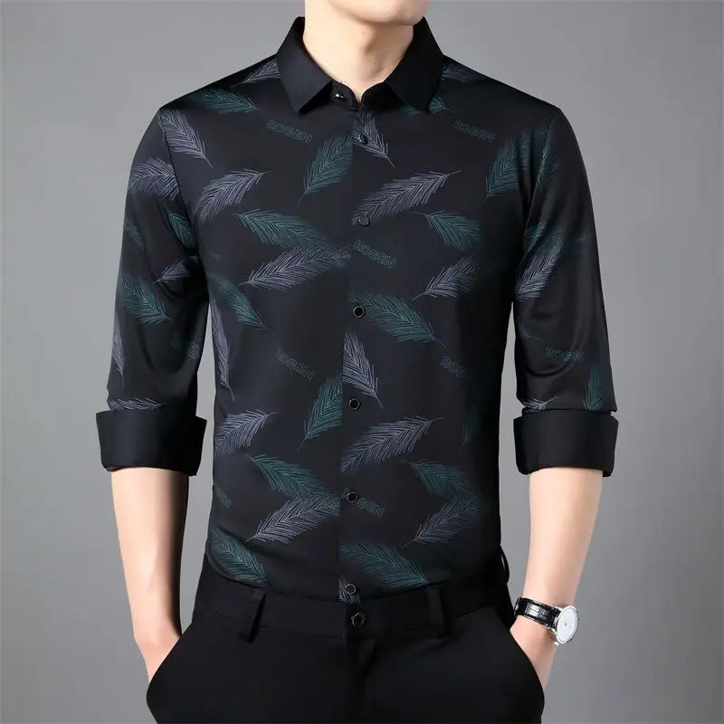 Camicia uomo casual chic rosso vino con stampa a piume. Manica lunga, vestibilità comoda, perfetta per moda uomo.