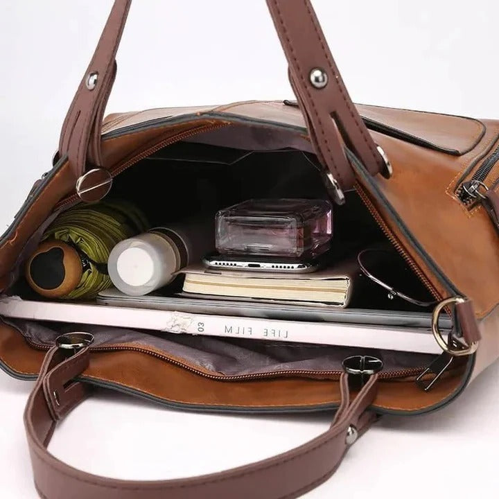 Borsa a tracolla strutturata da donna, design raffinato e cerniera sicura, perfetta per l'ufficio o il tempo libero.