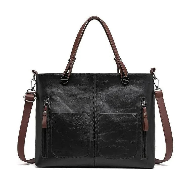 Borsa donna strutturata con cerniera e manici, ideale per organizzare i tuoi accessori con stile e praticità.