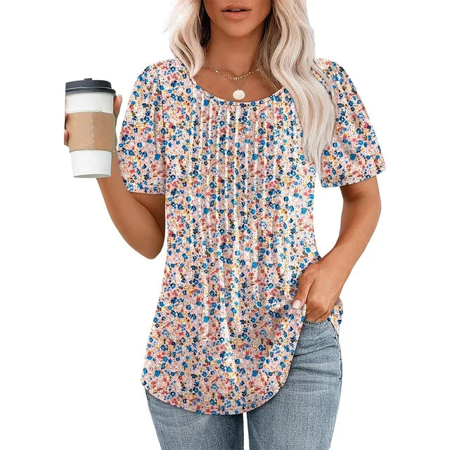 Blusa donna plissettata, scollo tondo e manica corta. Ideale per un look elegante e confortevole.