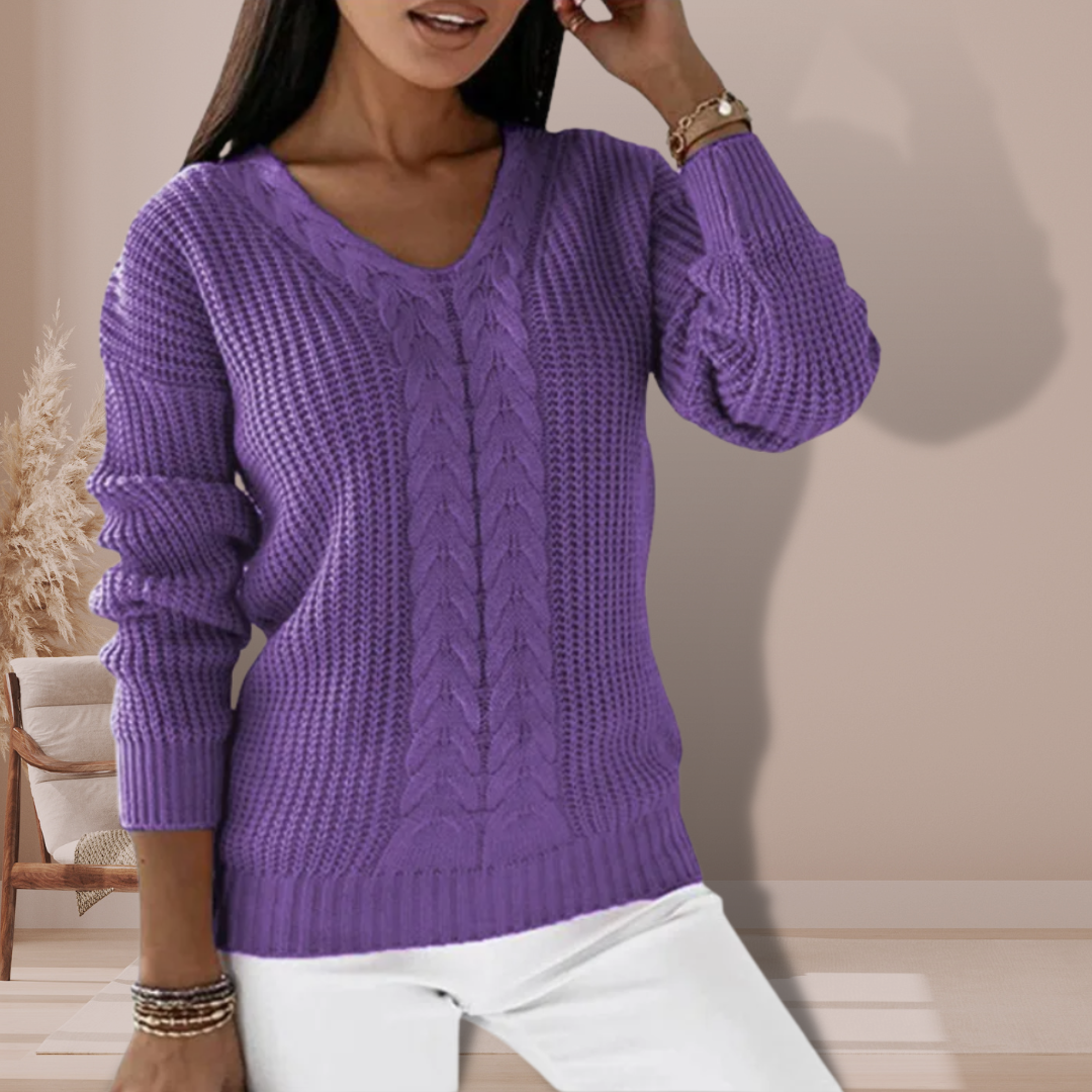 Maglione donna casual-elegante scollo a V, trama a trecce. Must-have per la moda invernale.