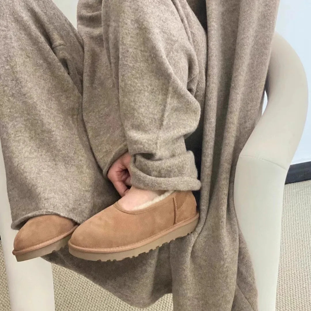 Eleganti mocassini donna marroni, comodi e cozy, perfetti per un look casual versatile.