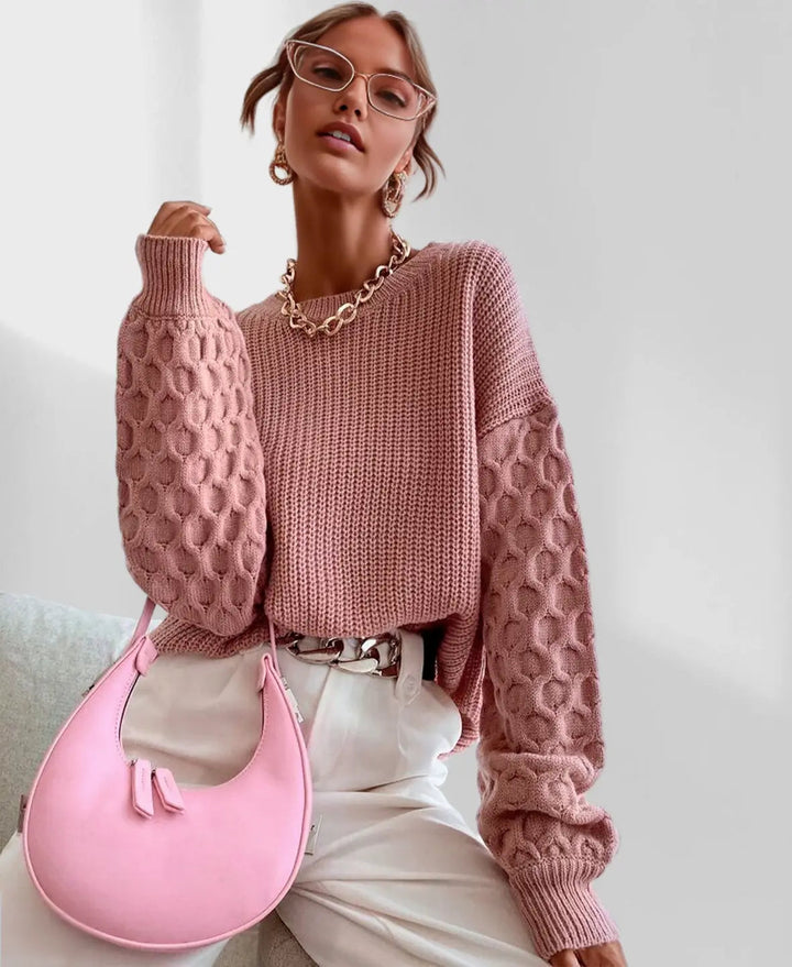 Maglione donna elegante con maniche a palloncino, ideale per un look casual invernale alla moda.