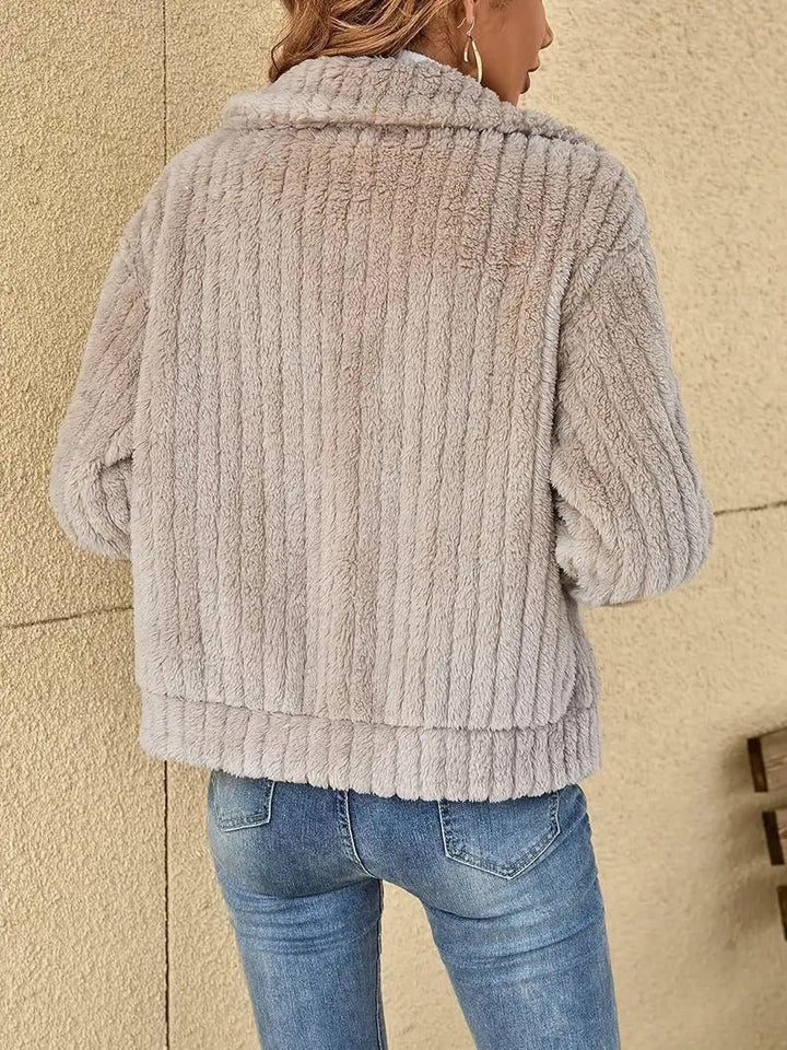 Morbido cardigan donna invernale con zip, lungo e comodo, perfetto per la moda autunno inverno.
