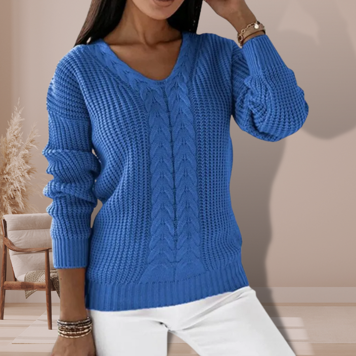 Maglione elegante donna scollo a V con texture a trecce, capo essenziale per moda casual invernale.