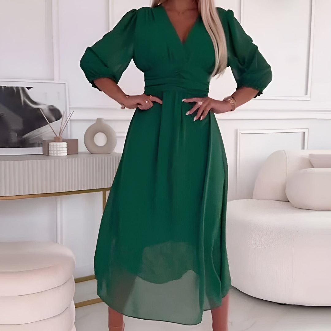 Abito midi donna elegante avvolgente per cerimonia, silhouette svasata. Perfetto per un look chic.