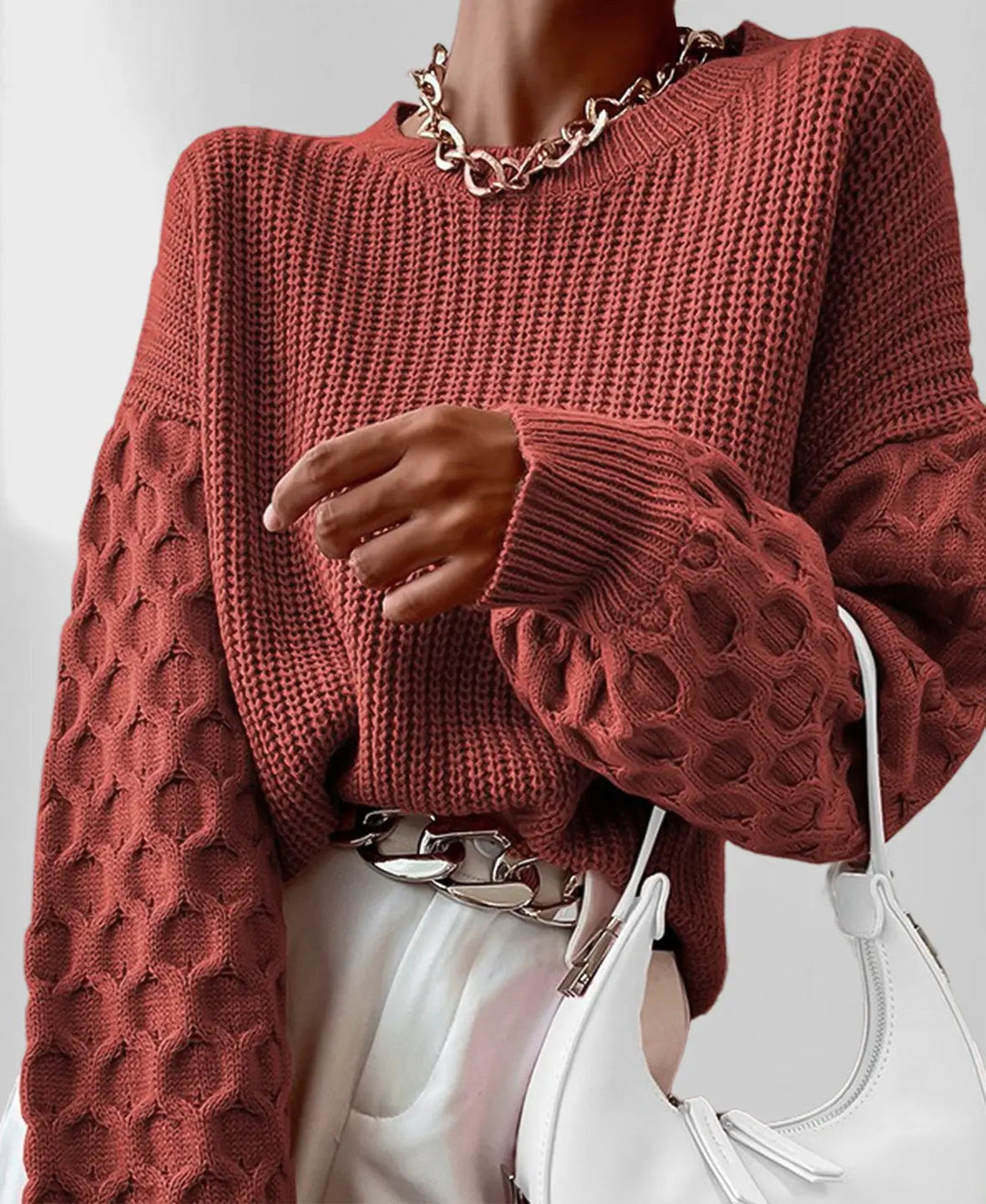 Maglione donna con ampie maniche a palloncino, caldo, comodo e di tendenza per l'inverno.