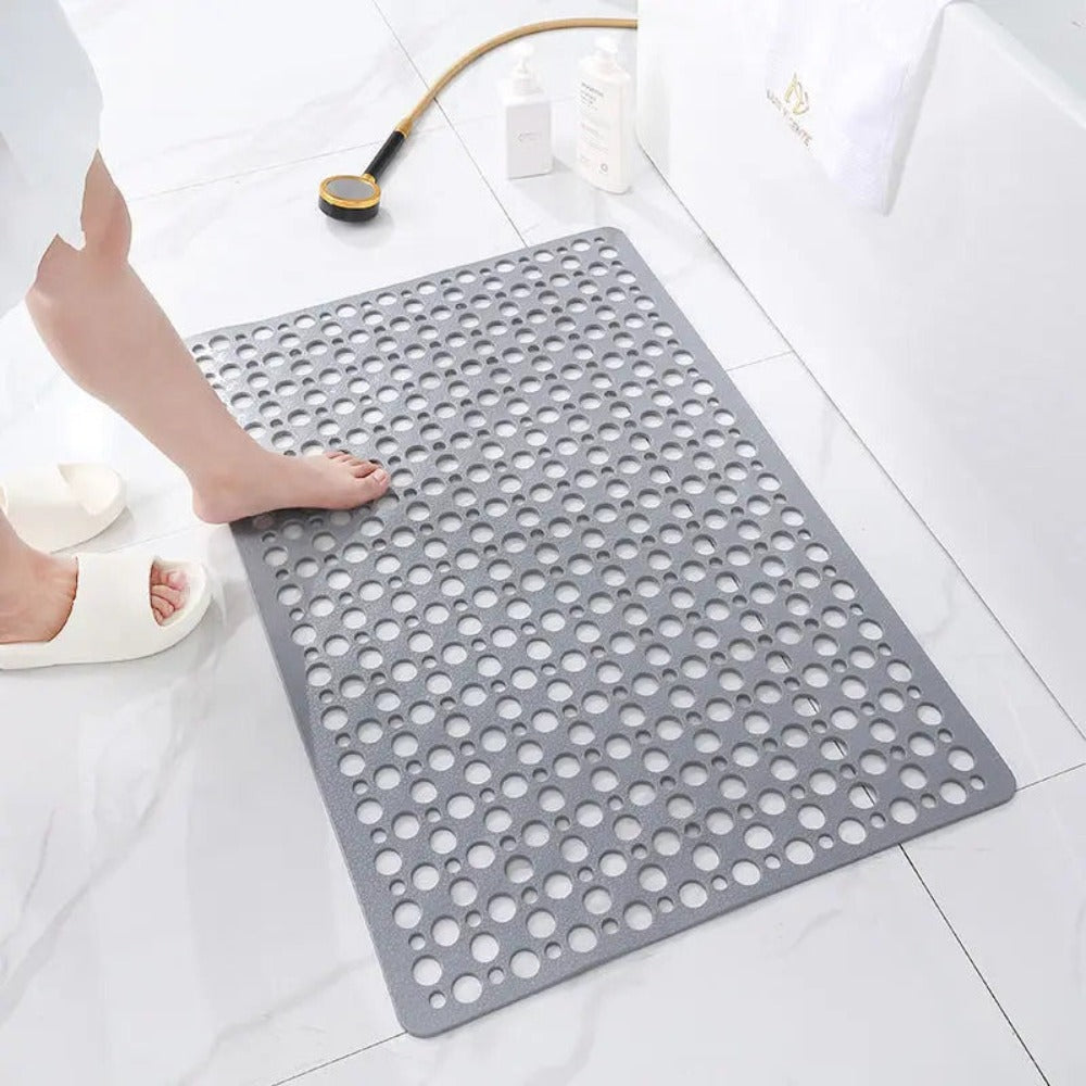 Tappetino doccia antiscivolo per anziani e bambini, garantisce sicurezza in vasca o piatto doccia.
