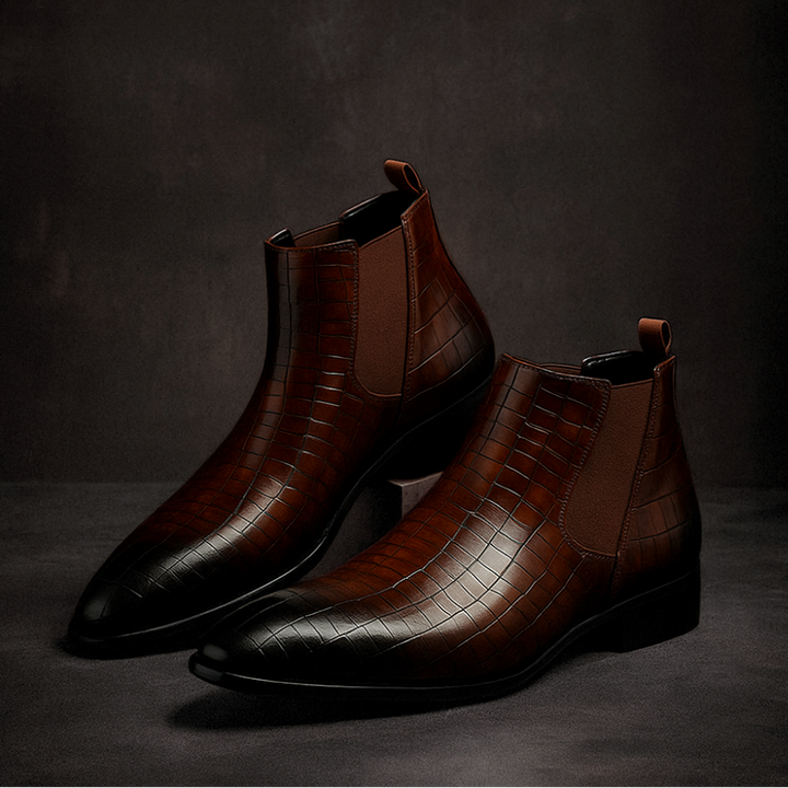 Eleganti stivaletti Chelsea uomo in pelle di serpente, perfetti per look business o serate casual.