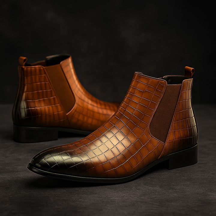 Stivaletti Chelsea uomo in pelle di serpente, ideali per outfit alla moda e occasioni speciali.